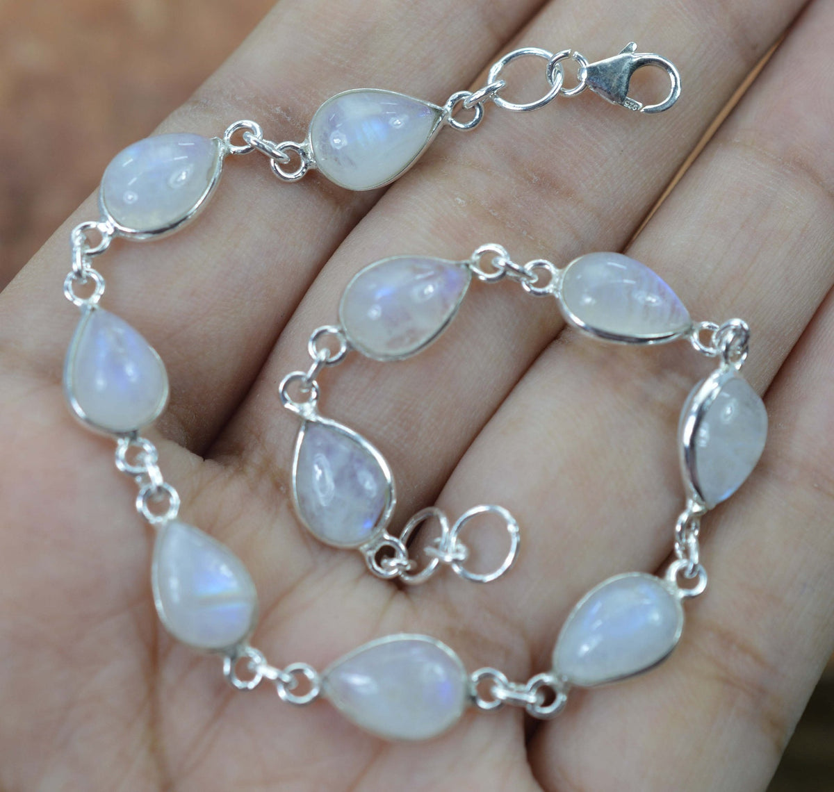 Nine Stone Cabochon Rainbow Moonstone Gemstone Bracelet in Sterling Silver Nine Stone Cabochon Rainbow Moonstone Gemstone Bracelet in Sterling Silver